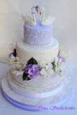 Свадебный торт с лебедями и кольцами