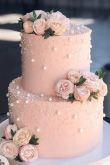 Свадебный торт с кольцами наверху
