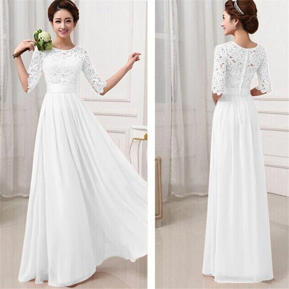 Кружевное свадебное платье на белом фоне