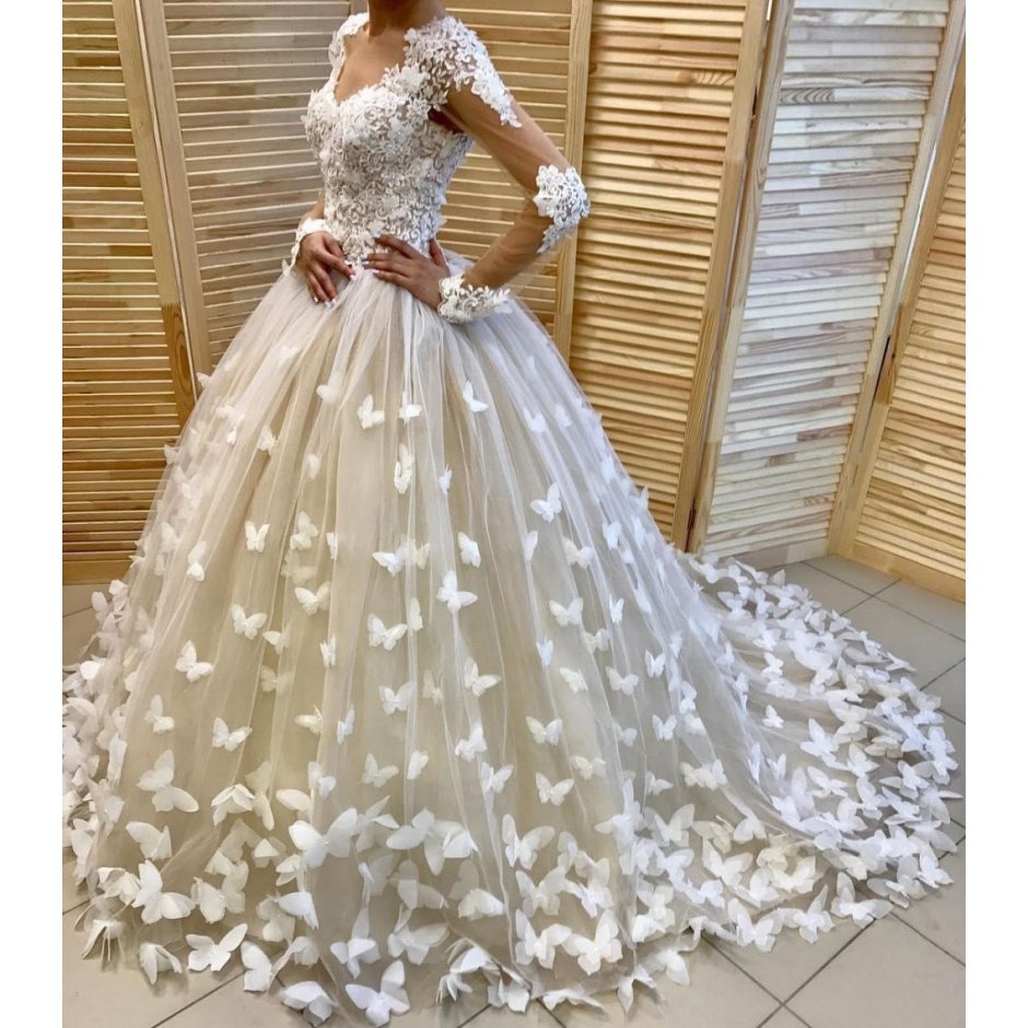 Блестящее свадебное платье с рукавами