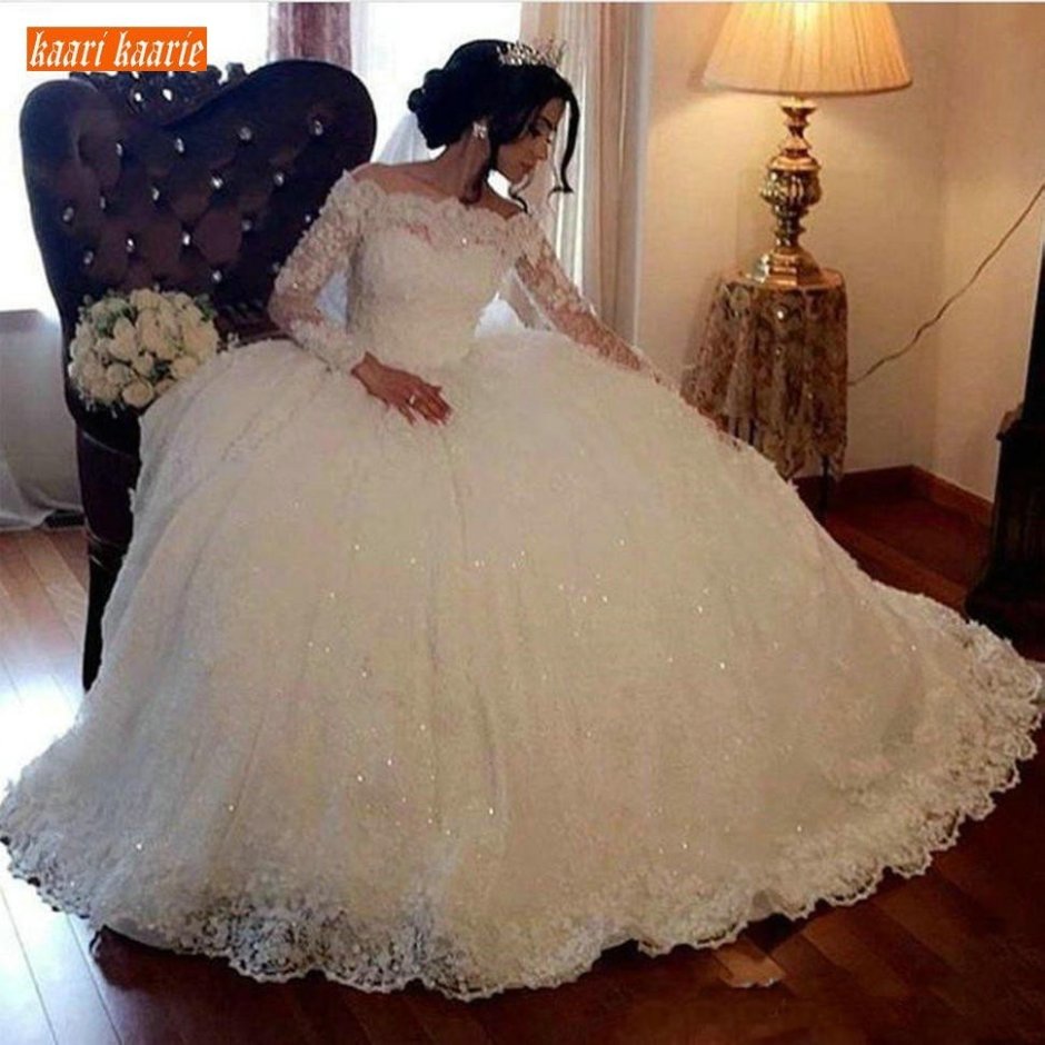 Свадебное платье с пышными рукавами