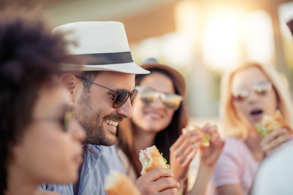 People eating Sandwich