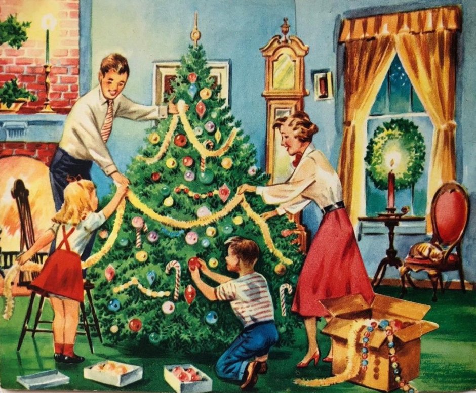 Семья украшает елку
