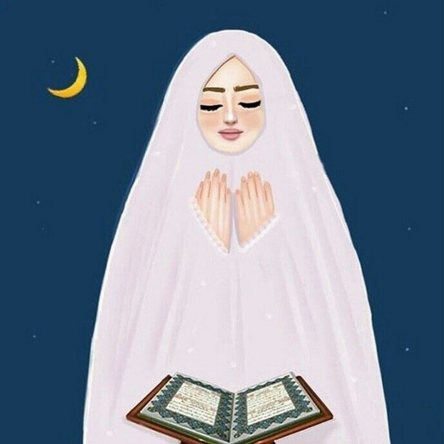 Девушка в хиджабе с Кораном