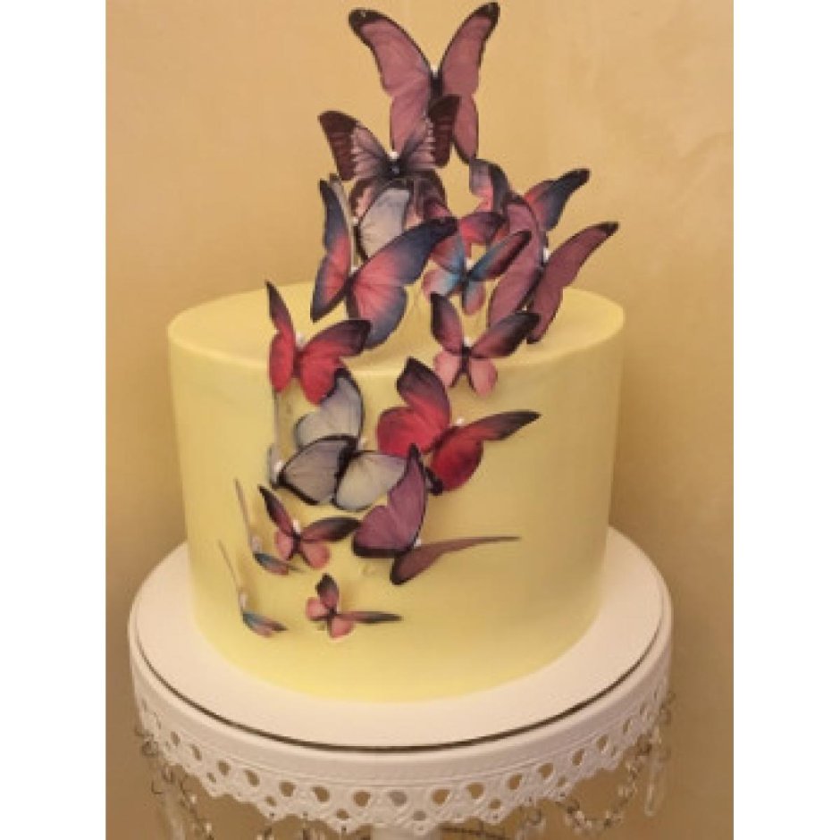 Декор торта вафельными бабочками