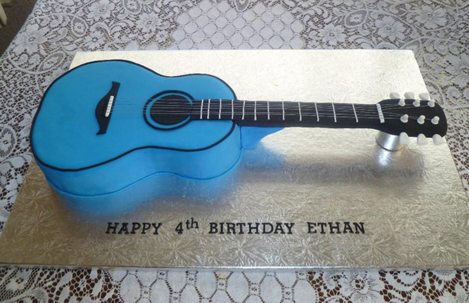 Торт черный с гитарой
