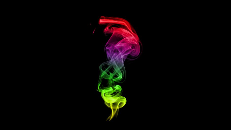 Разноцветный дым на черном фоне