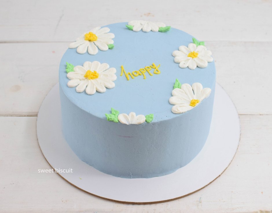Голубой торт с ромашками и надписью Happy