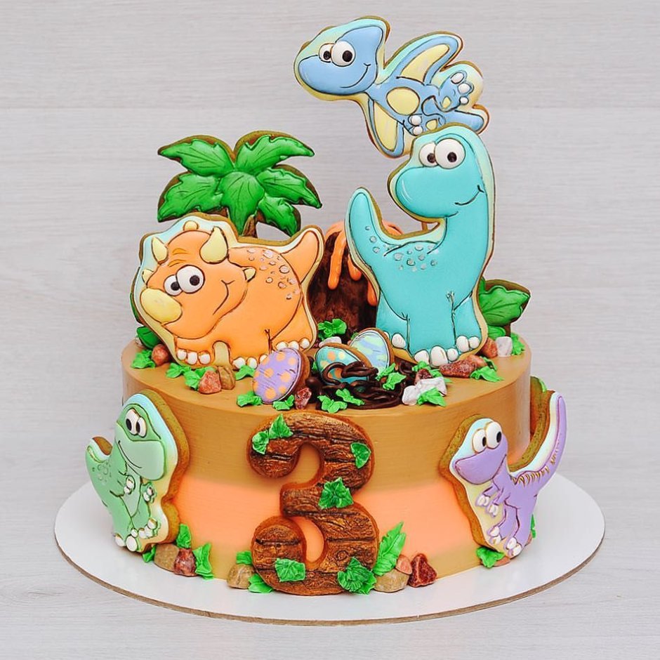 Двухярусный торт с динозаврами