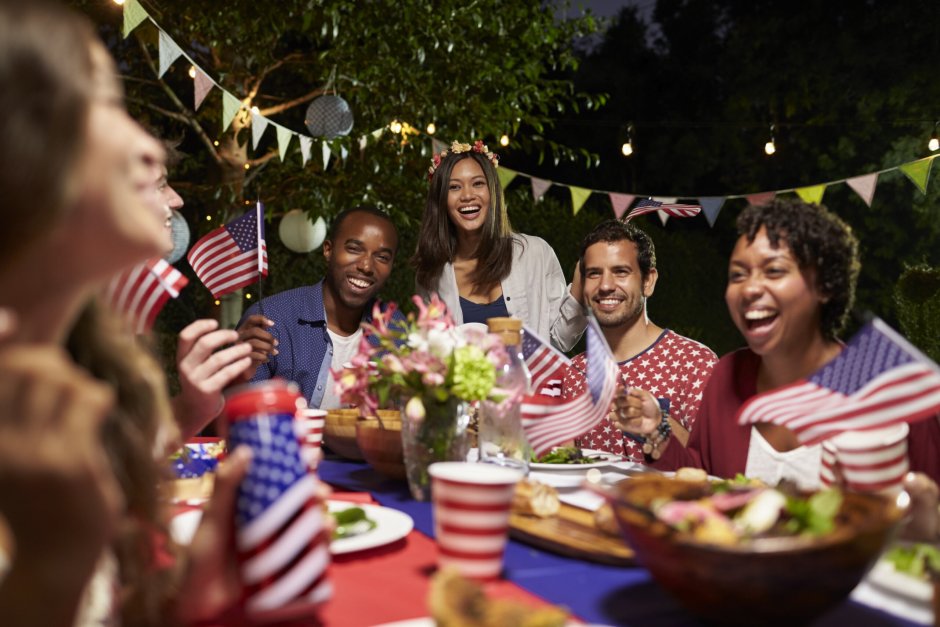 Friends celebrating 4th of July Holiday with Backyard Party