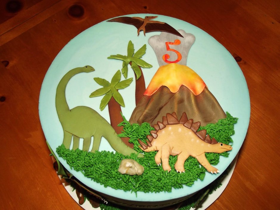 Круглый торт динозавр
