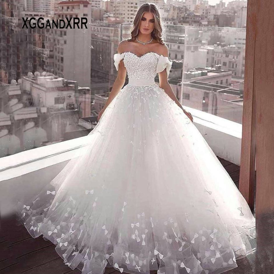 Свадебное платье со спущенными рукавами крылышками фото