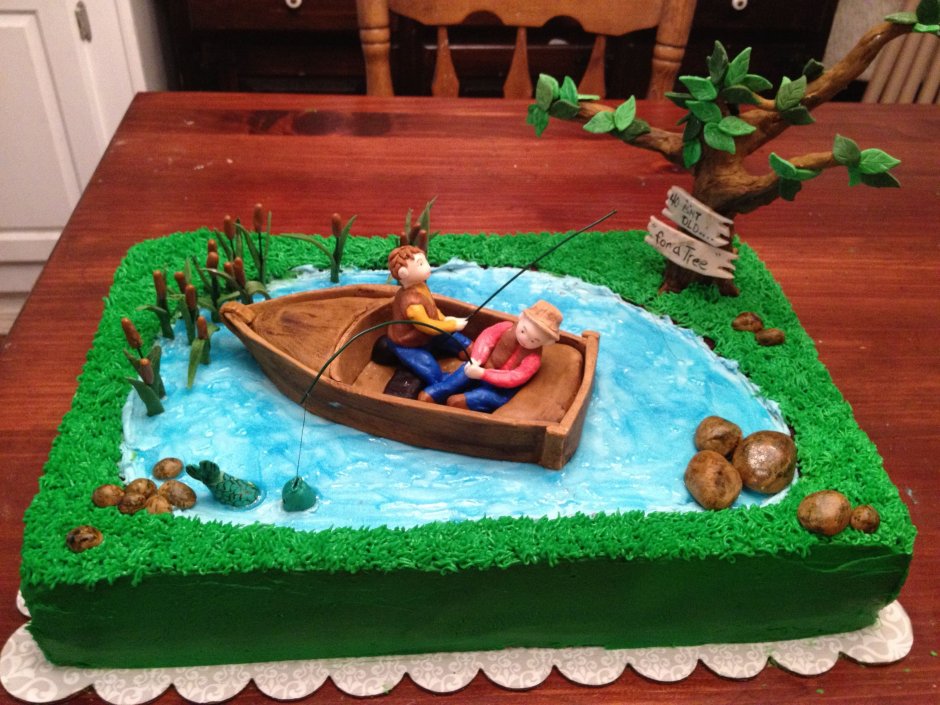 Торт с рыбаком в лодке