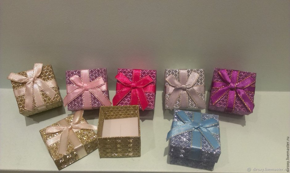 Упаковка новогодних подарков в крафт бумагу
