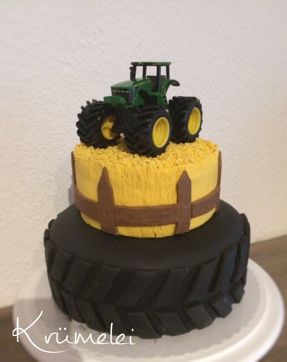 Двухярусный торт с трактором.