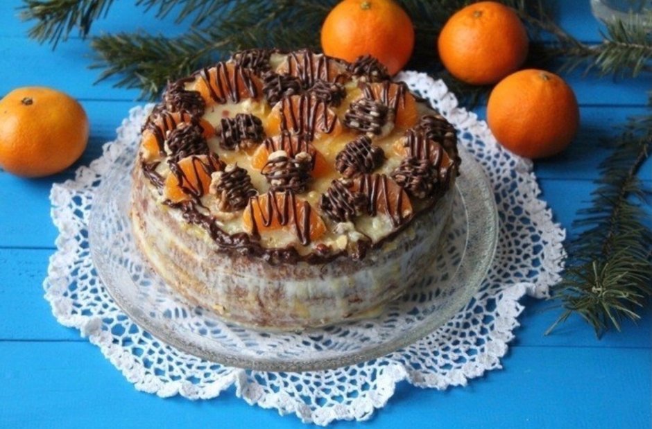 Украшение торта апельсинами и орехами