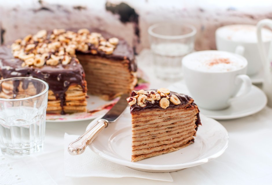 Slice of delicious naked Coffee and Hazelnuts Cake