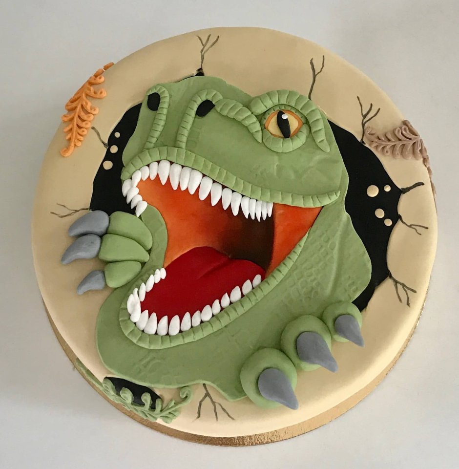 Мордочка розового динозавра на тортике