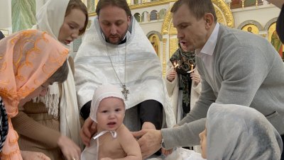 Ребенок после крещения новобогоявленный